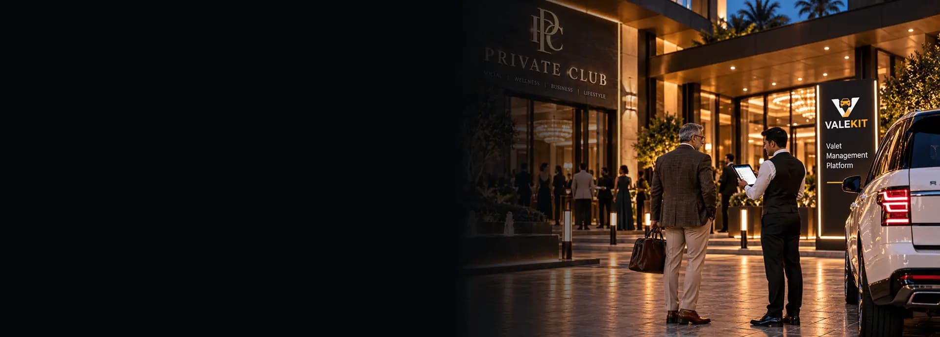Valet attendant using ValeKit private club valet software on a tablet at a private club entrance at night